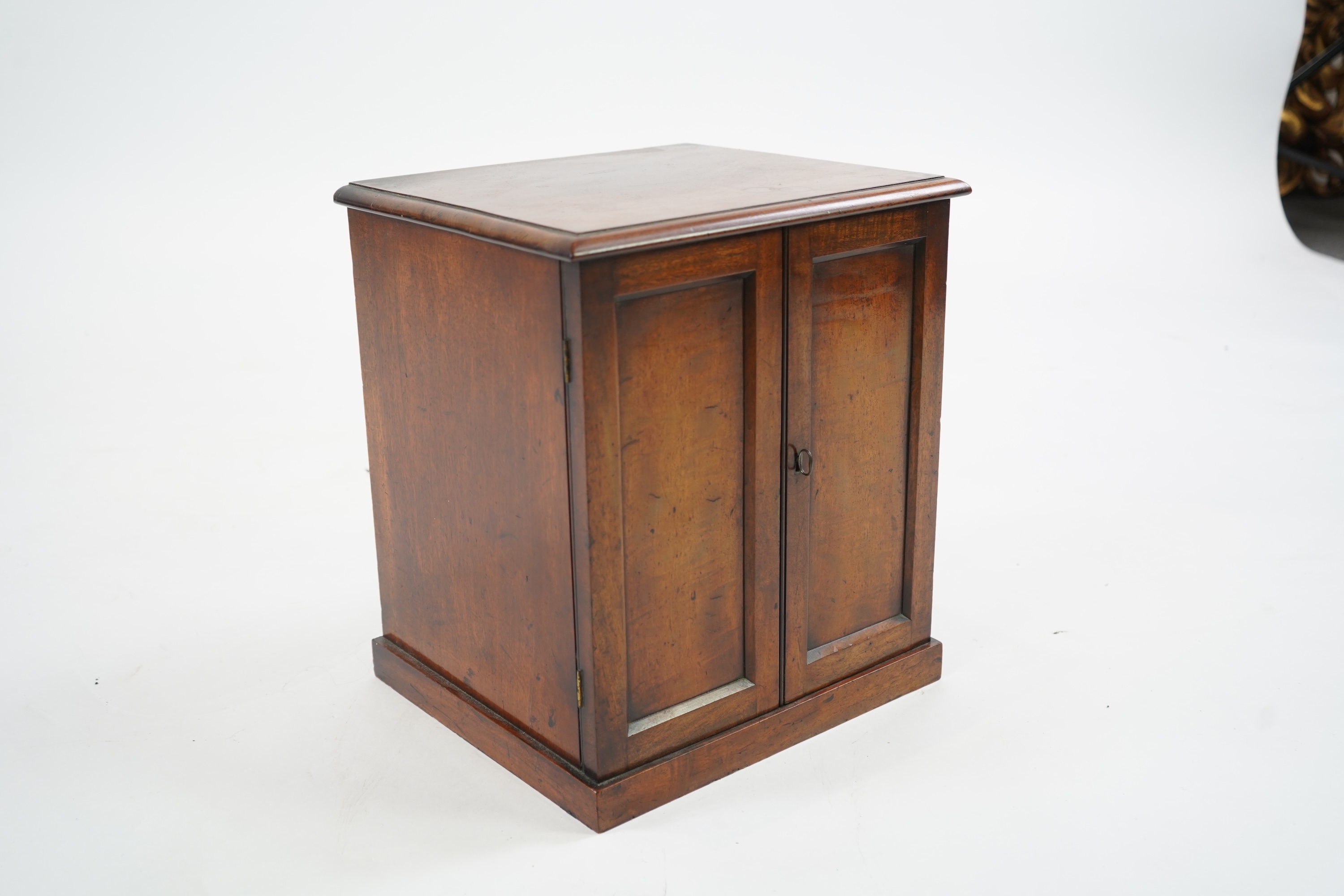 A George IV mahogany table top collectors cabinet